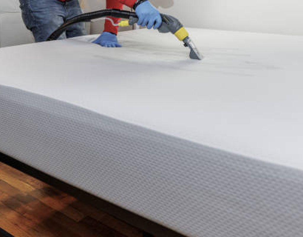 Residential cleaning experts mopping floors and disinfecting high-touch household areas